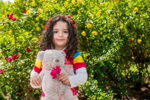 عکاسی از کودکان همراه با اسباب بازی